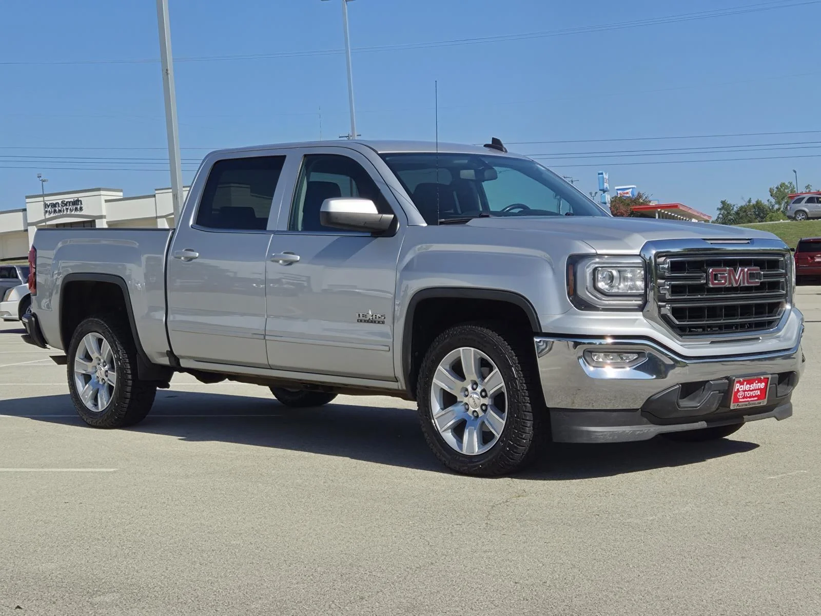 Used 2018 Quicksilver Metallic GMC 2WD Crew Cab 143.5 SLE image 1