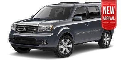 Used 2012 Alabaster Silver Metallic Honda Touring image 1