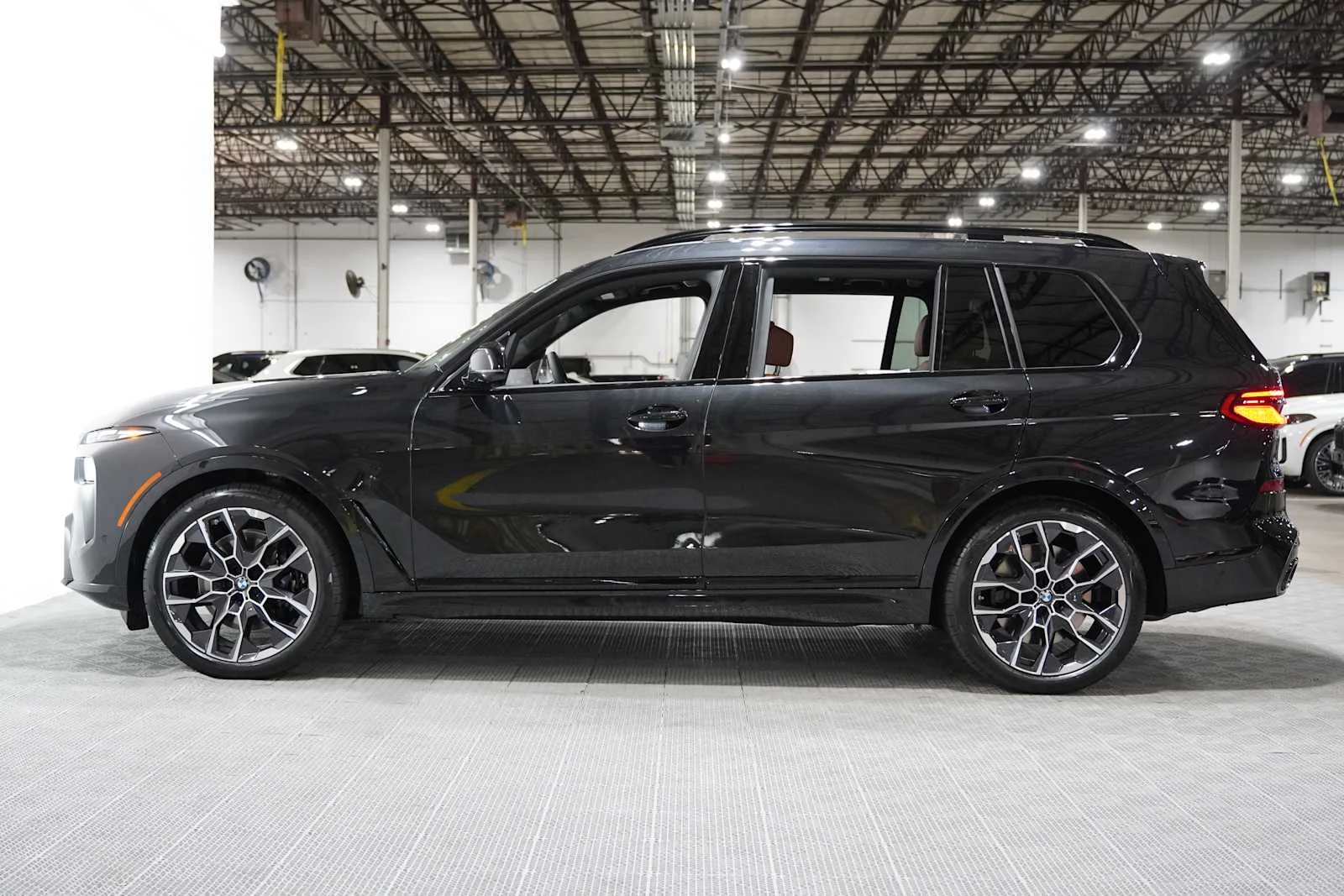 New 2027 Black Sapphire Metallic BMW M60i image 2