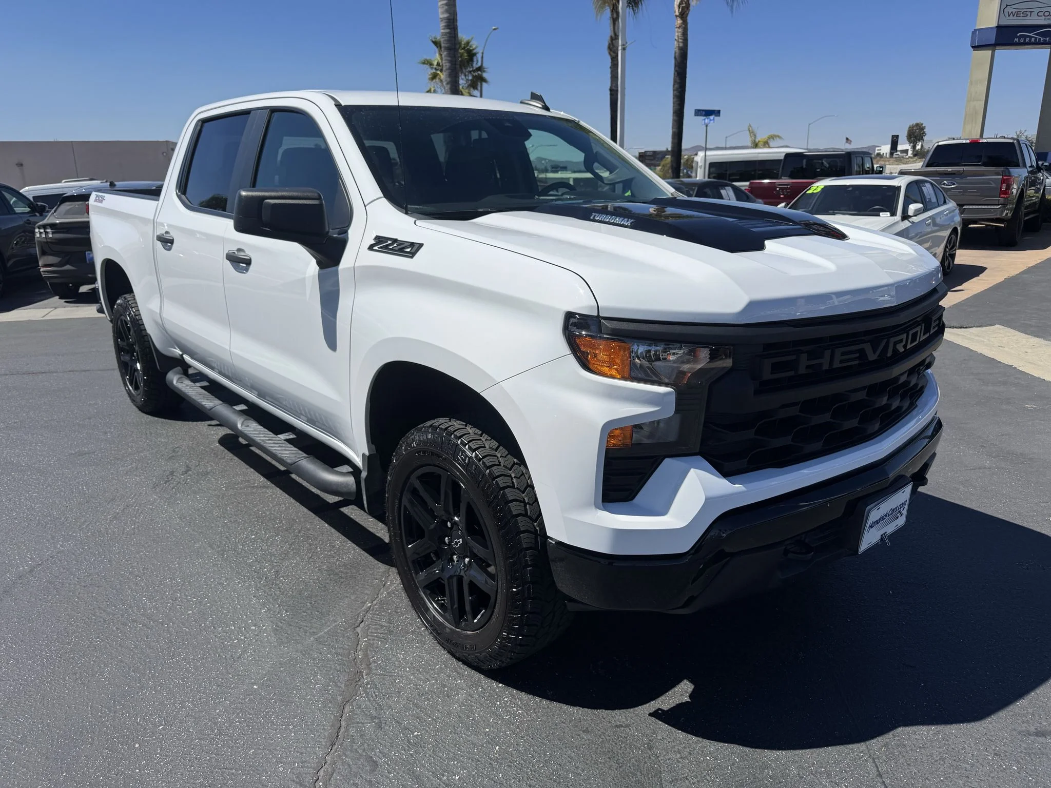 Used 2024 SUMMIT WHITE Chevrolet Custom Trail Boss image 1