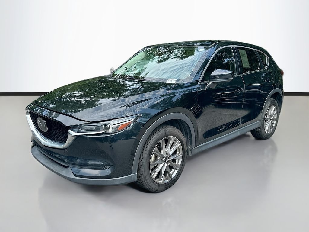 Used 2021 Black Mazda Grand Touring Reserve image 1