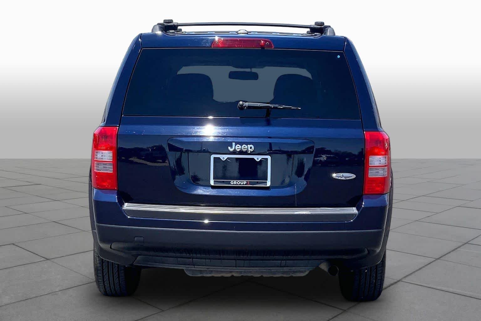 Used 2014 True Blue Pearlcoat Jeep High Altitude image 5