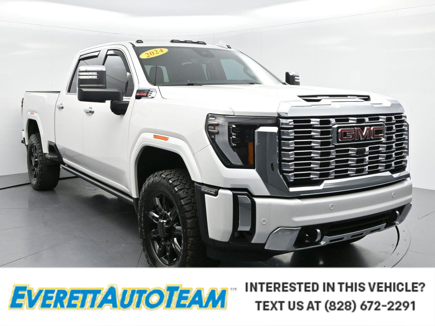 Used 2024 White Frost Tricoat GMC Denali image 1