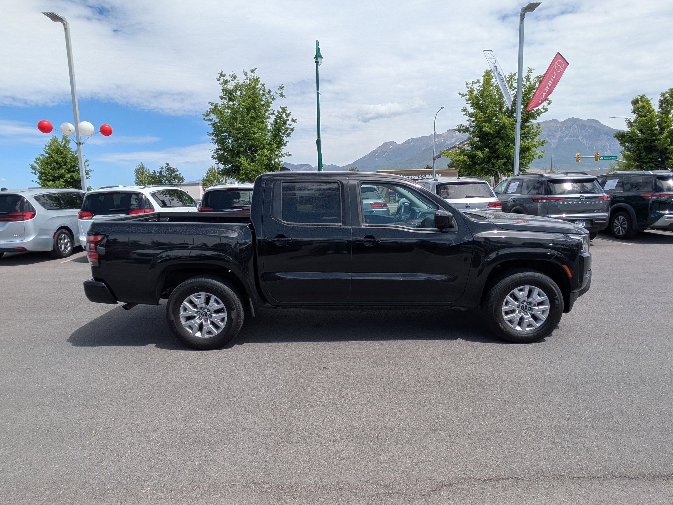 Used 2023 Super Black Nissan SV image 2