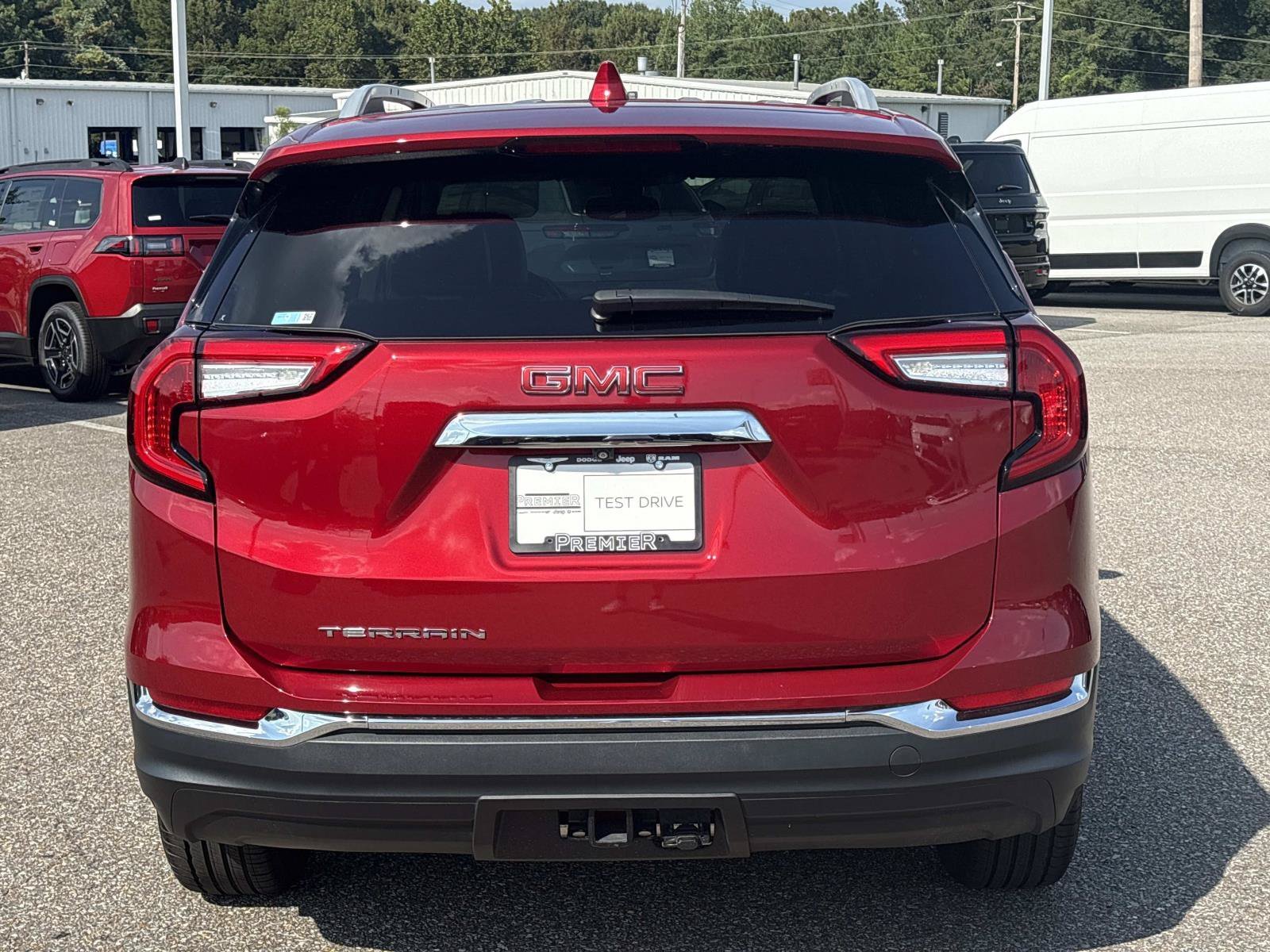 Used 2024 Volcanic Red Tintcoat GMC SLT image 6
