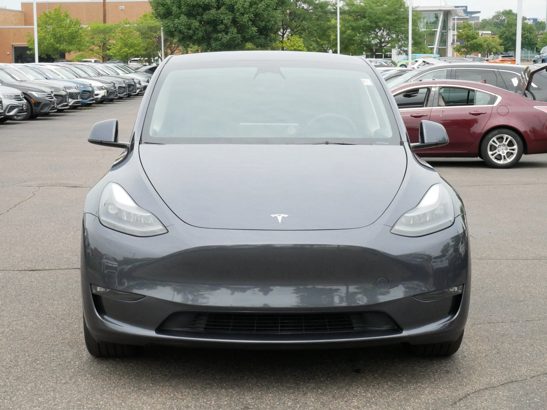 Used 2023 Tesla Model Y Long Range with VIN 7SAYGDEE7PF788509 for sale in St. Louis Park, MN