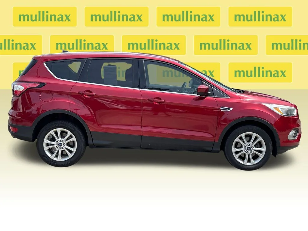 Used 2017 Ford Escape SE with VIN 1FMCU0GD6HUD56625 for sale in New Smyrna Beach, FL