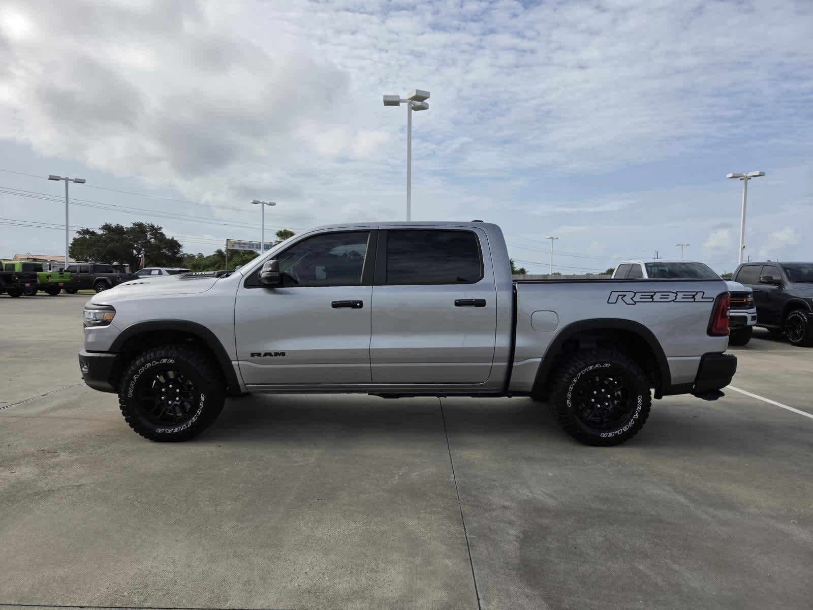 Used 2025 Billet Silver Metallic Clearcoat Ram Rebel image 2