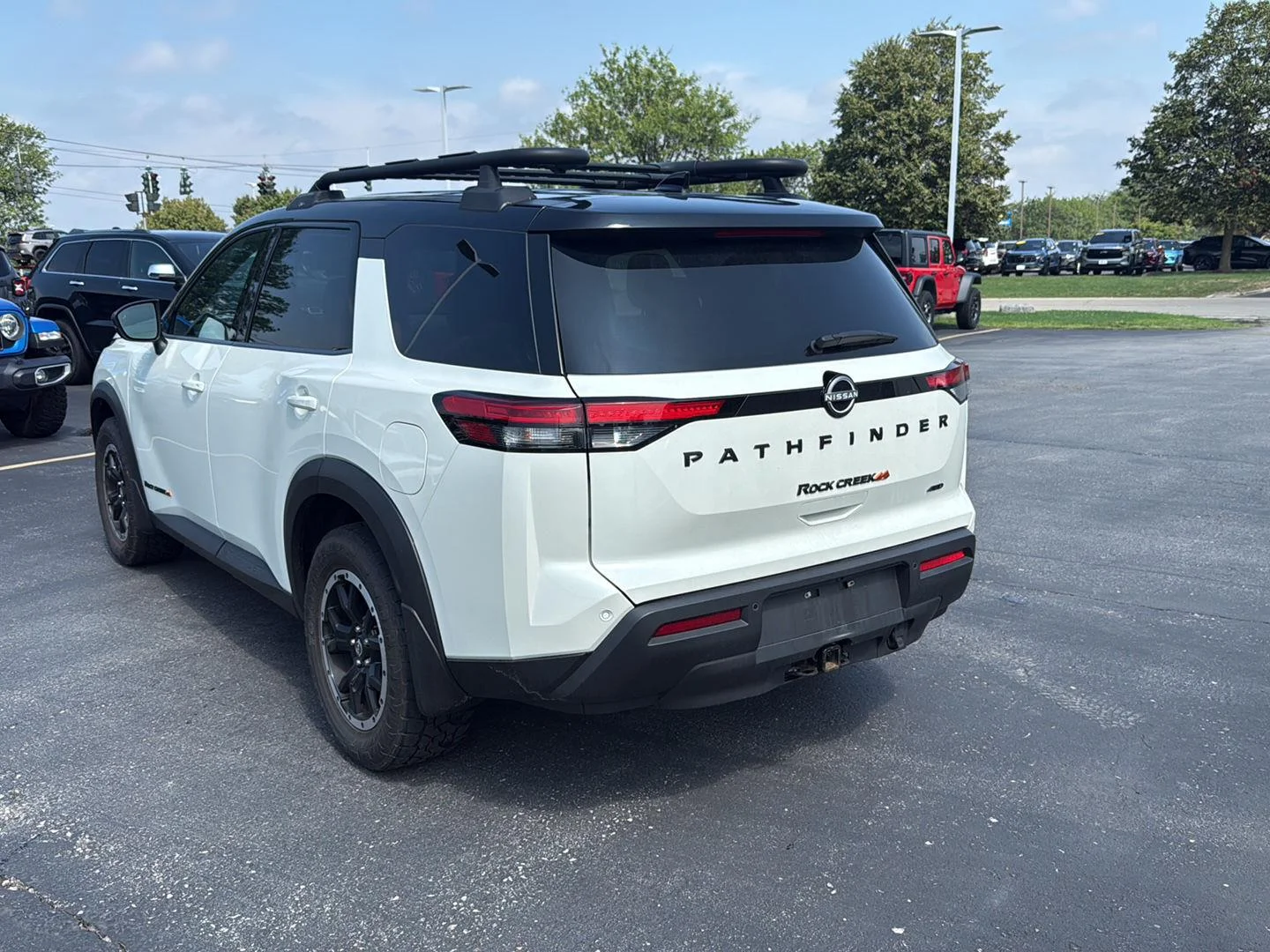 Used 2024 Pearl White Tricoat/Super Black Nissan Rock Creek image 5