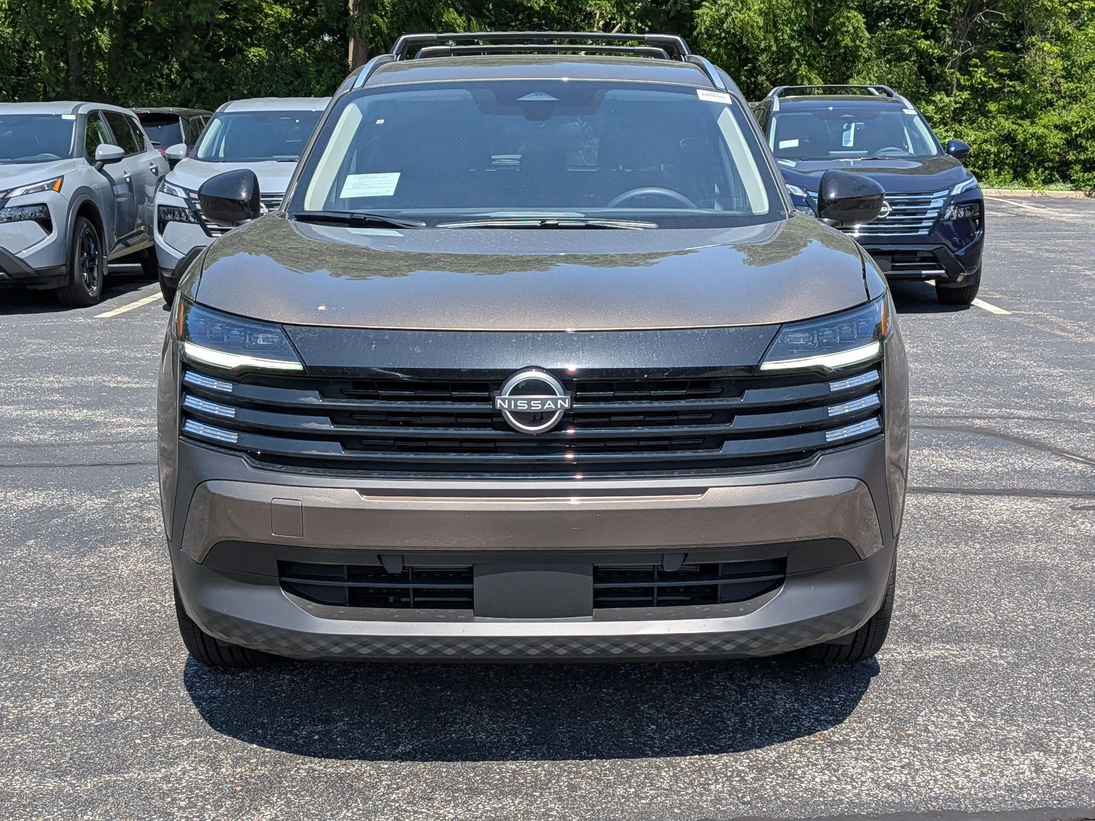 New 2026 Bronze Metallic Nissan SV image 5