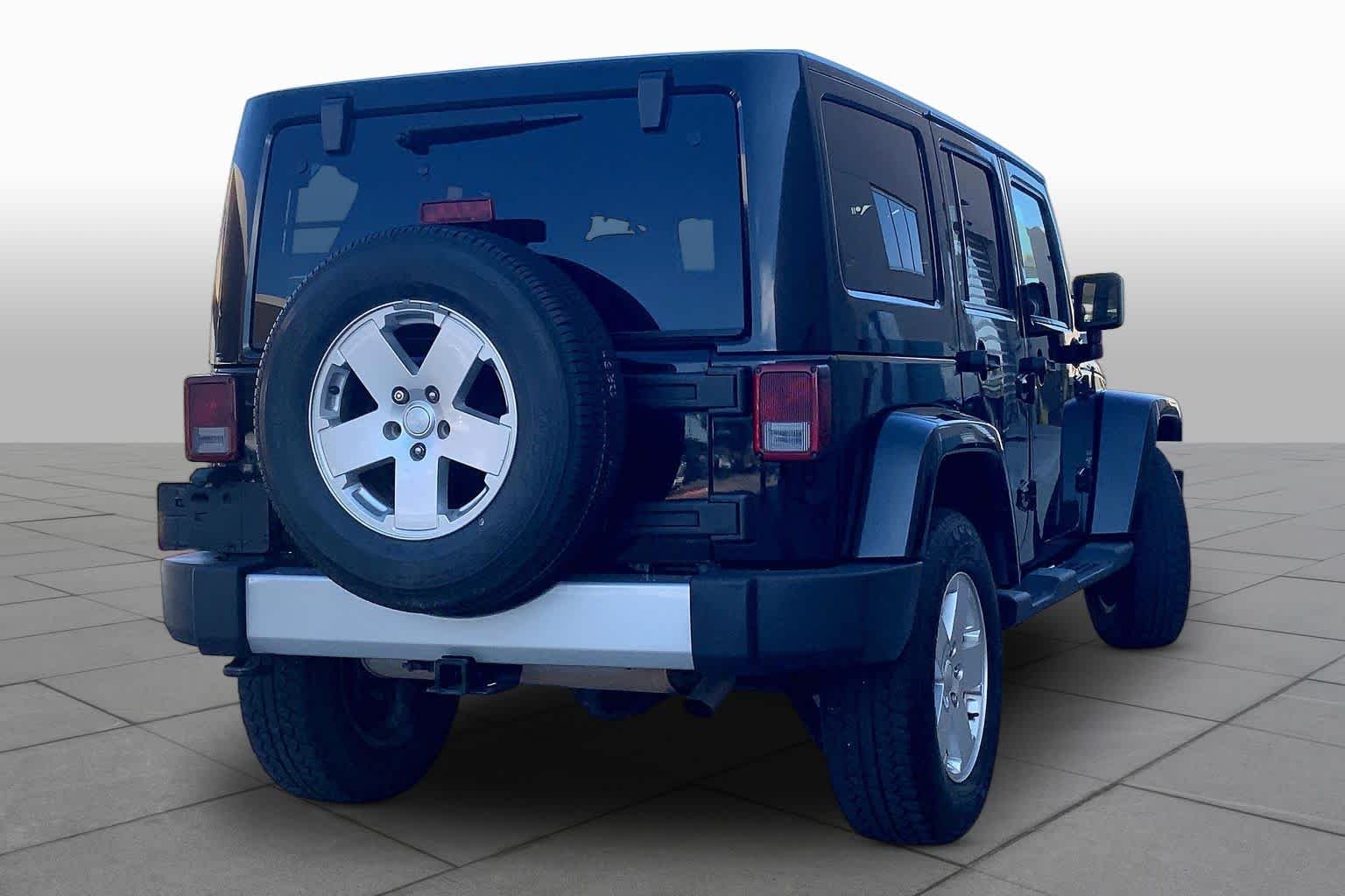 Used 2012 Black Jeep Sahara image 12