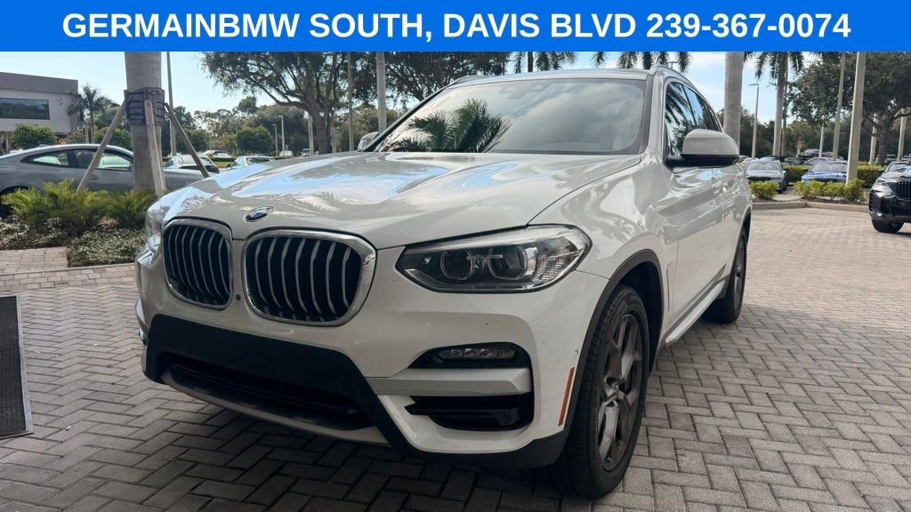 Used 2021 Alpine White BMW sDrive30i image 1