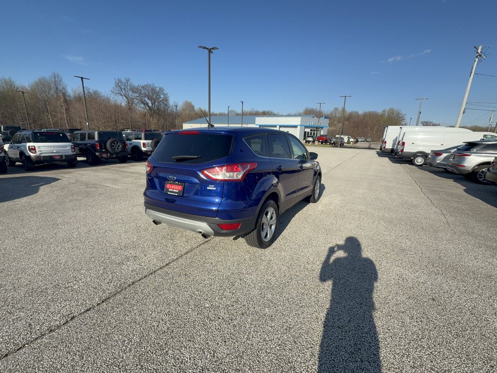 Used 2016 Deep Impact Blue Ford SE image 4