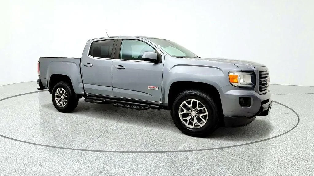 Used 2019 Satin Steel Metallic GMC 4WD Crew Cab 128.3