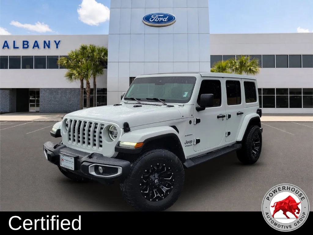 Used 2021 White Jeep Unlimited Sahara image 1