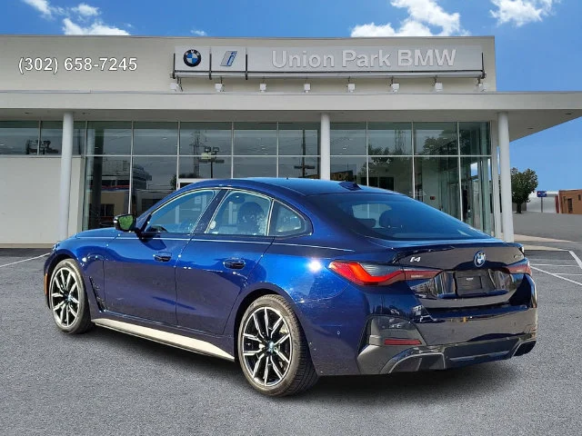 Certified Used 2022 Tanzanite Blue II Metallic BMW eDrive40 image 6