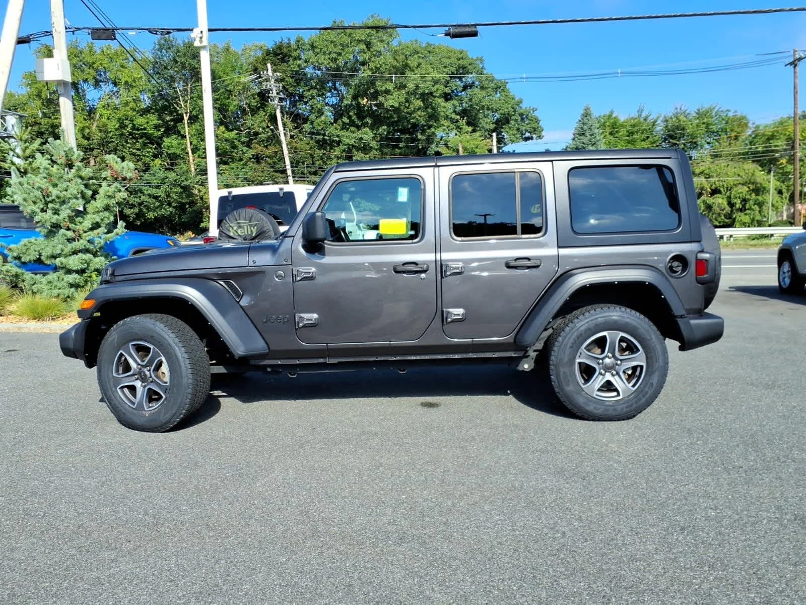 Certified Used 2022 Granite Crystal Metallic Clearcoat Jeep Unlimited Sport S image 12