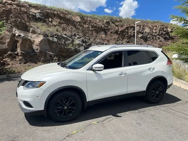 Used 2016 Pearl White Nissan SV image 1