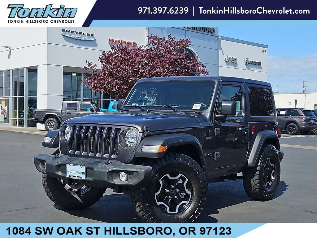 Used 2023 Granite Crystal Metallic Clearcoat Jeep Sport S image 1