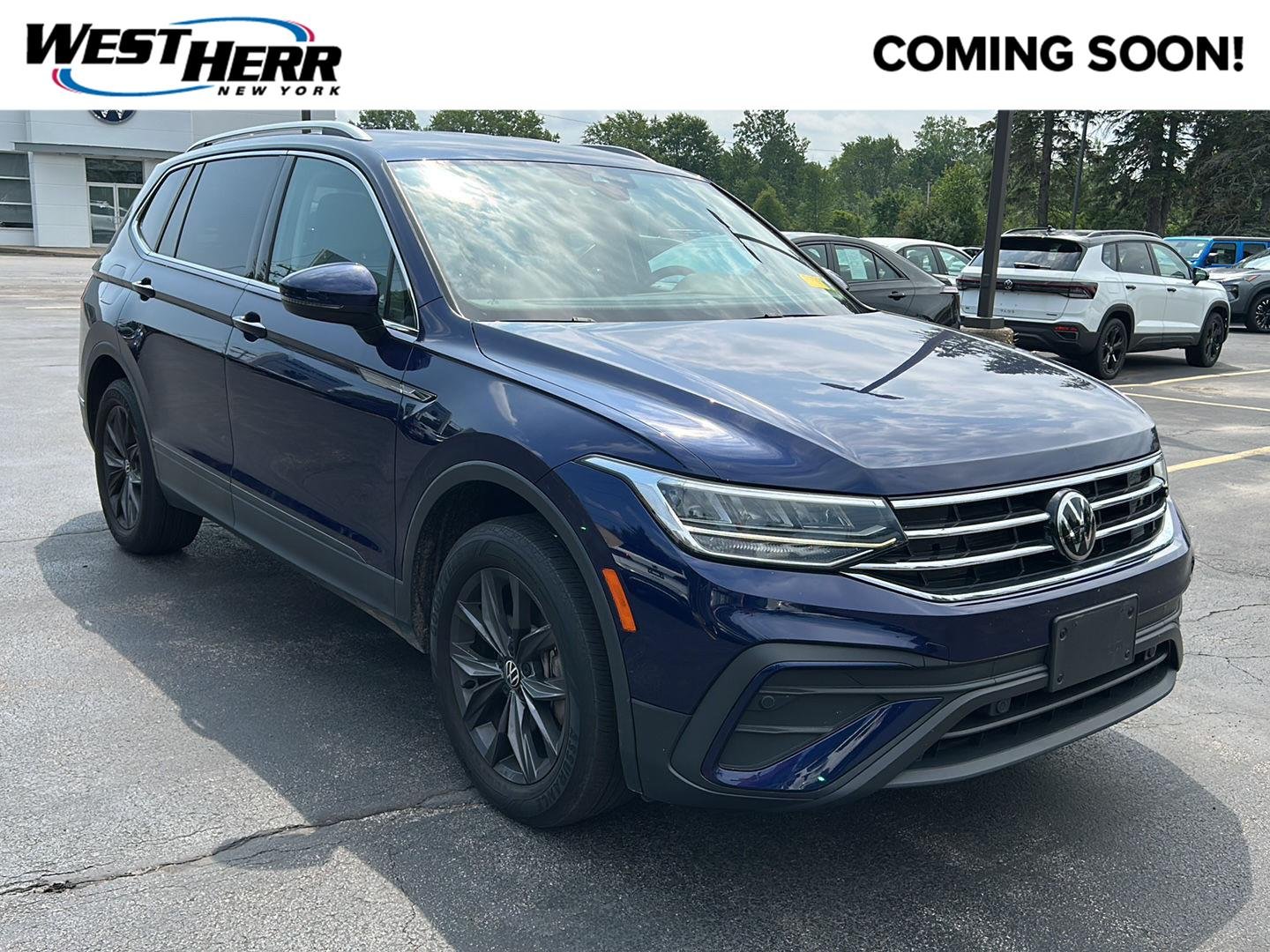 Used 2022 Atlantic Blue Metallic Volkswagen SE image 1
