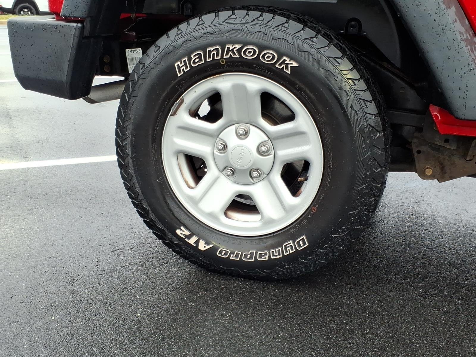 Used 2013 Flame Red Clearcoat Jeep Sport image 10