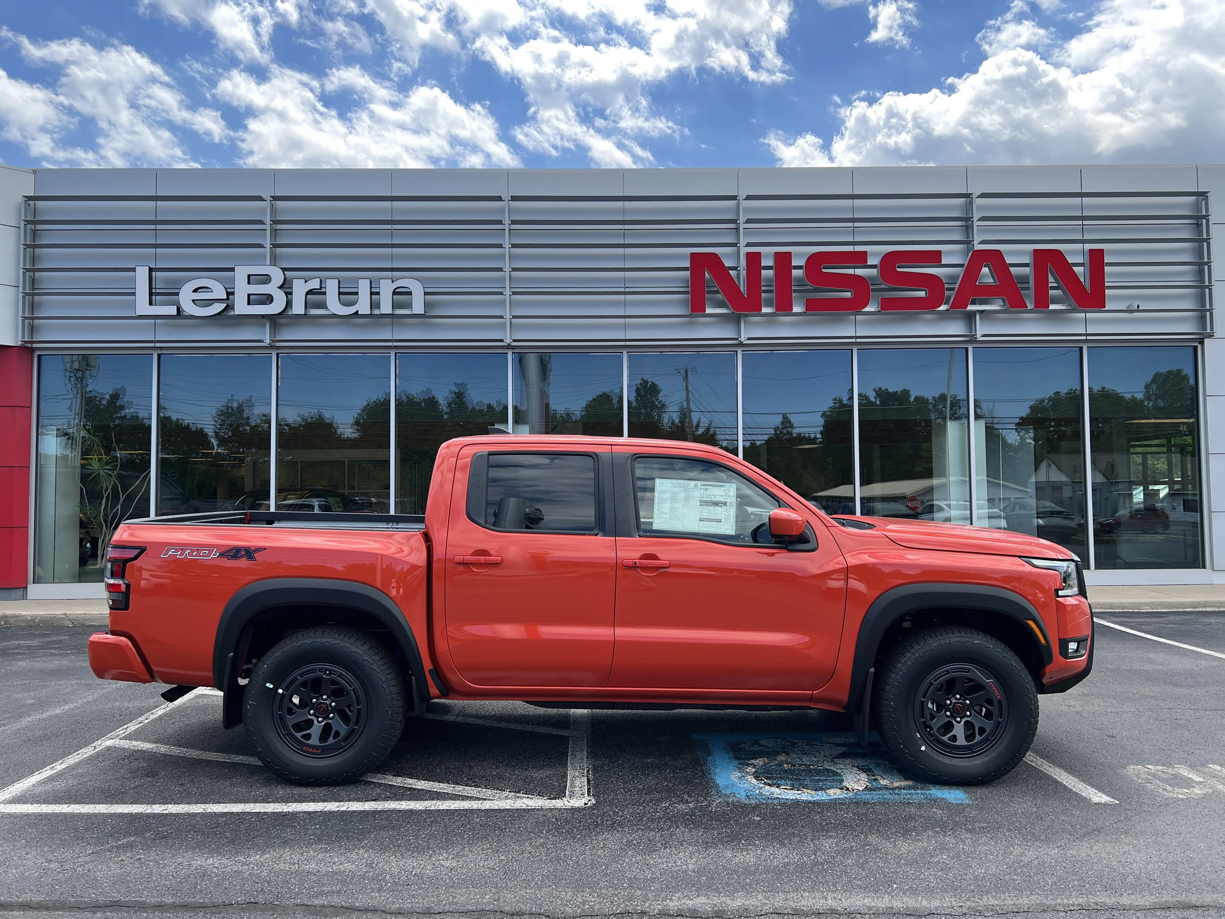 New 2026 Afterburn Orange Nissan Crew Cab PRO-4X® image 1