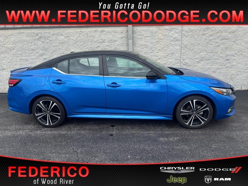 Used 2023 Electric Blue Metallic Nissan SR CVT image 1