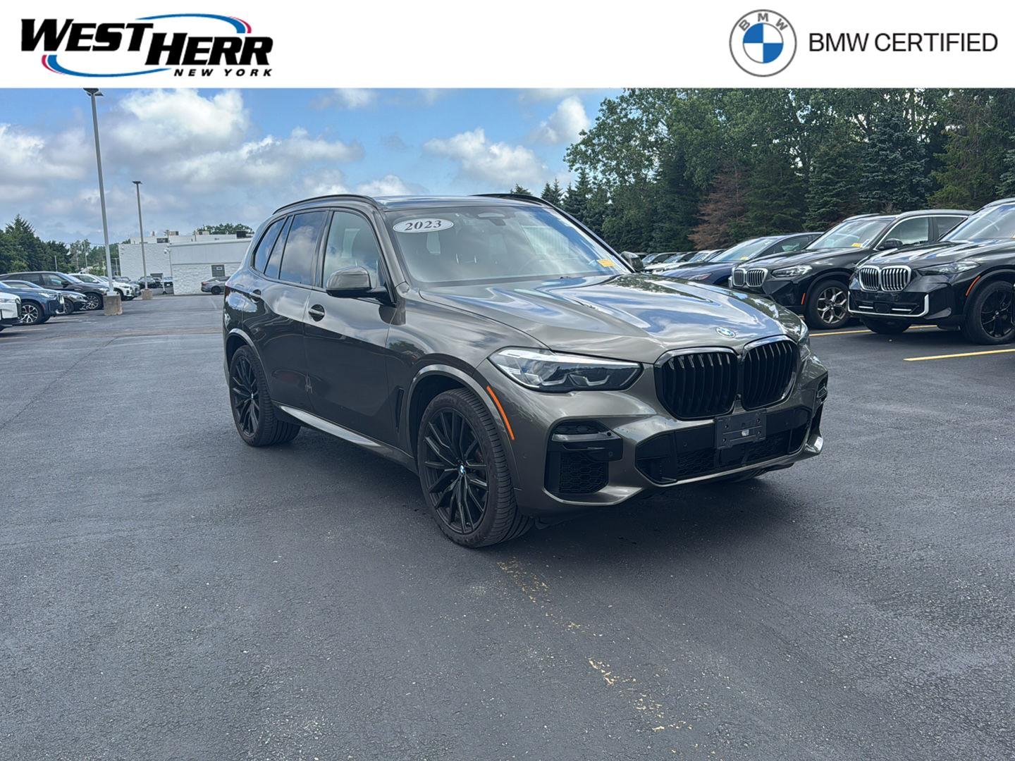 Certified Used 2023 Manhattan Green Metallic BMW xDrive40i image 1