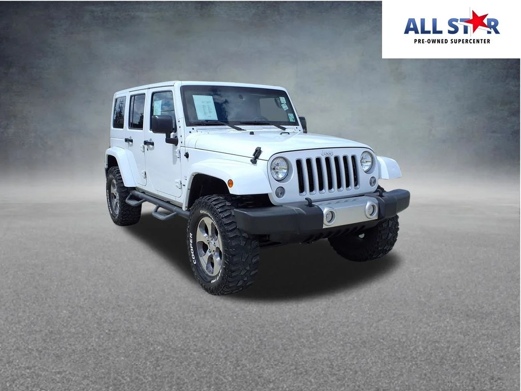Used 2016 White Jeep Unlimited Sahara image 1