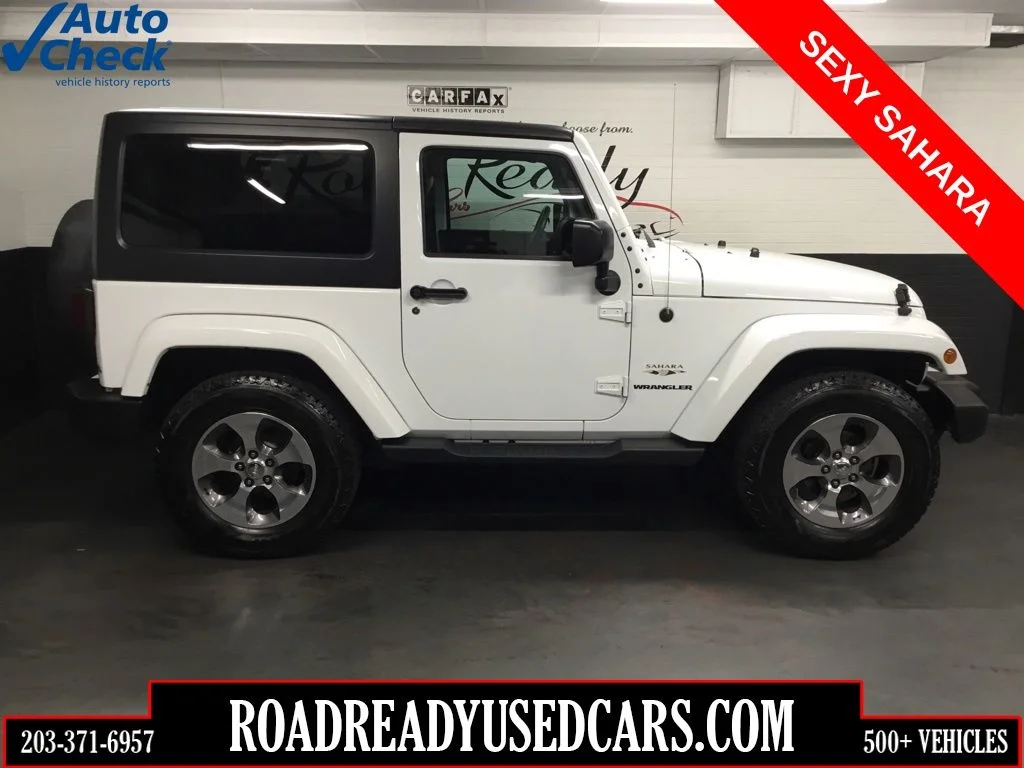 Used 2016 White Jeep Sahara image 1