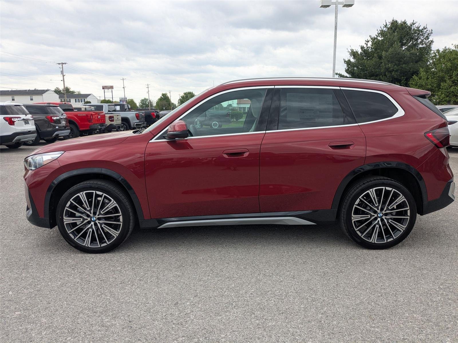 New 2026 Vegas Red Metallic BMW xDrive28i image 8