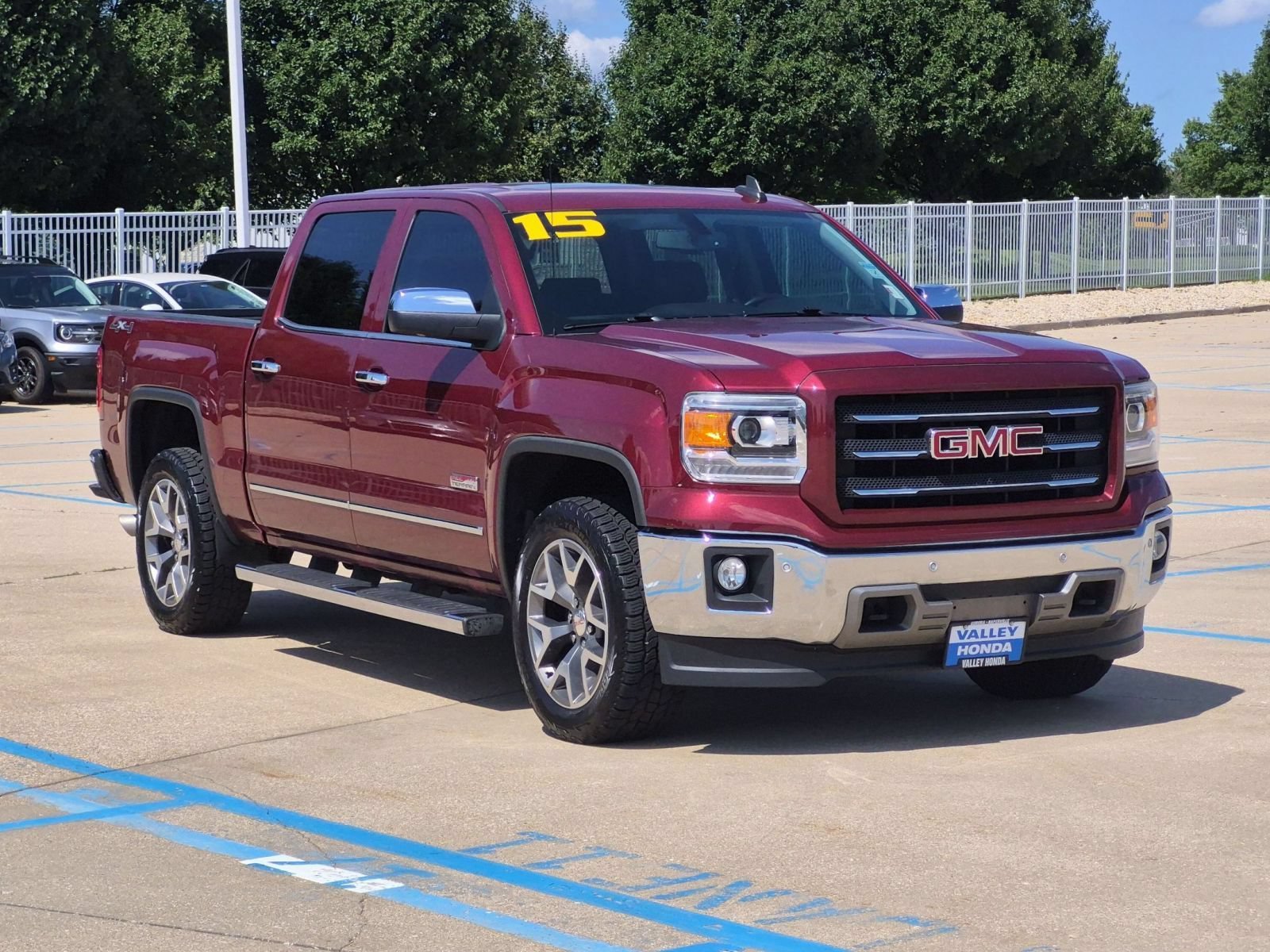 Used 2015 Sonoma Red Metallic GMC SLT 4WD image 4