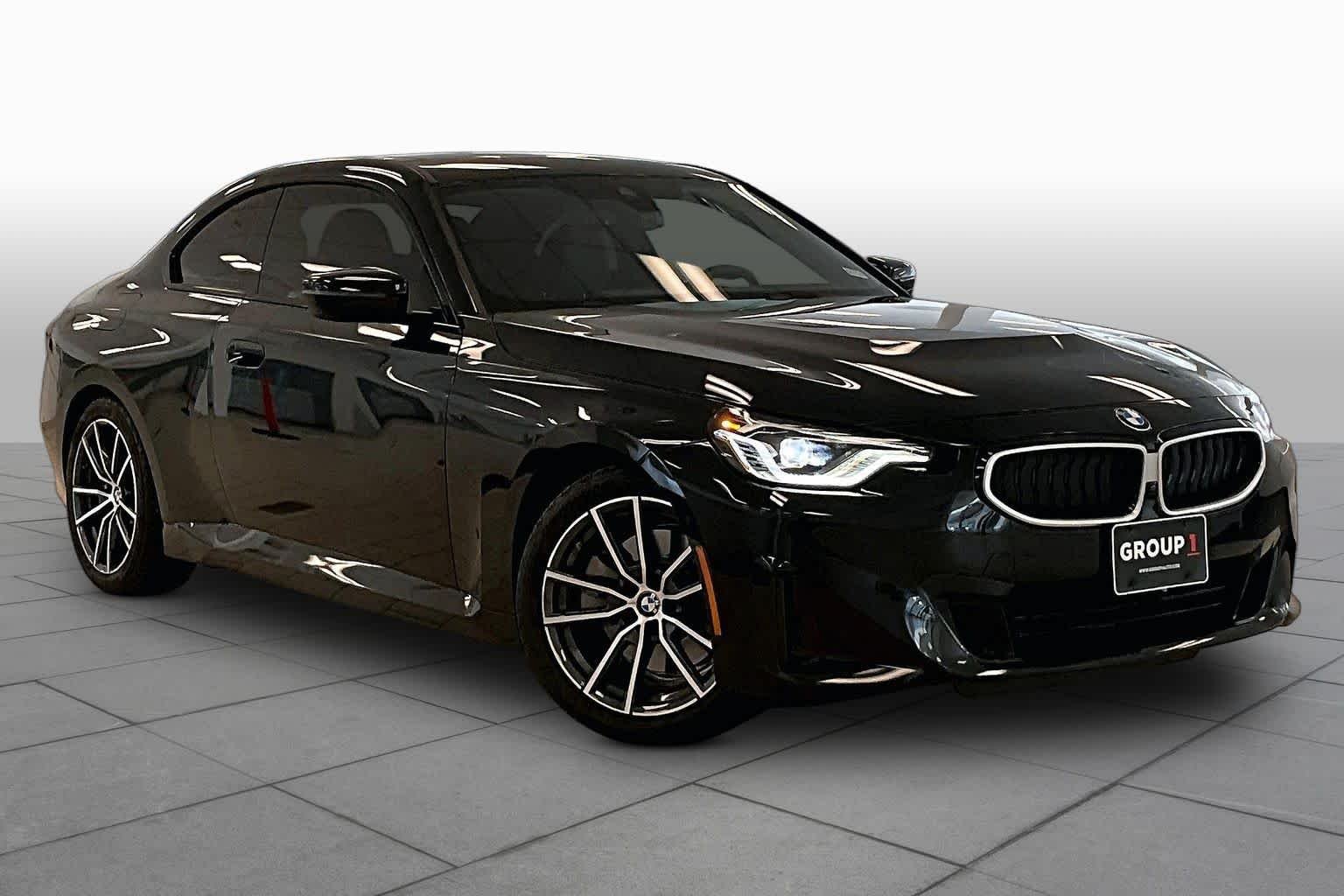 Used 2025 Black Sapphire Metallic BMW 230i image 2