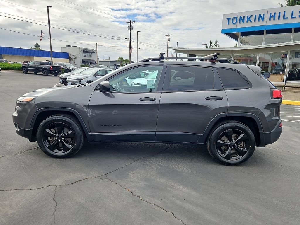 Used 2016 Granite Crystal Metallic Clearcoat Jeep Sport image 3
