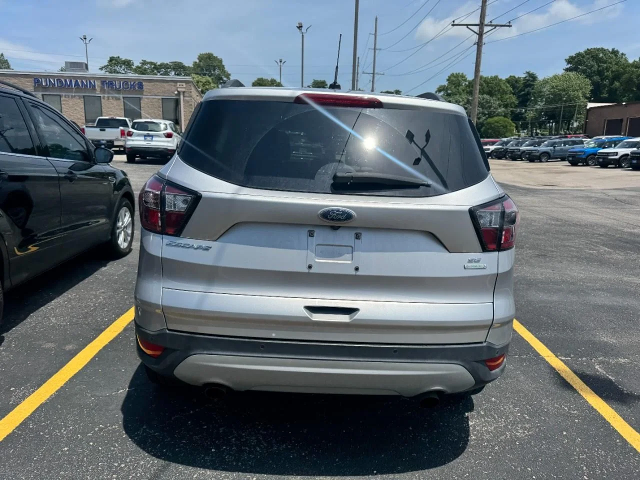 Used 2017 Ingot Silver Metallic Ford SE FWD image 8