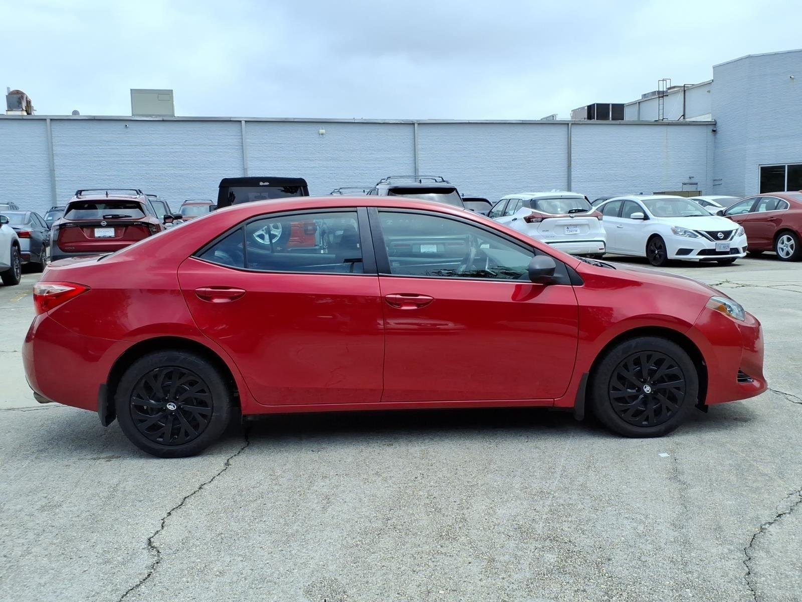 Used 2018 Barcelona Red Metallic Toyota LE image 7