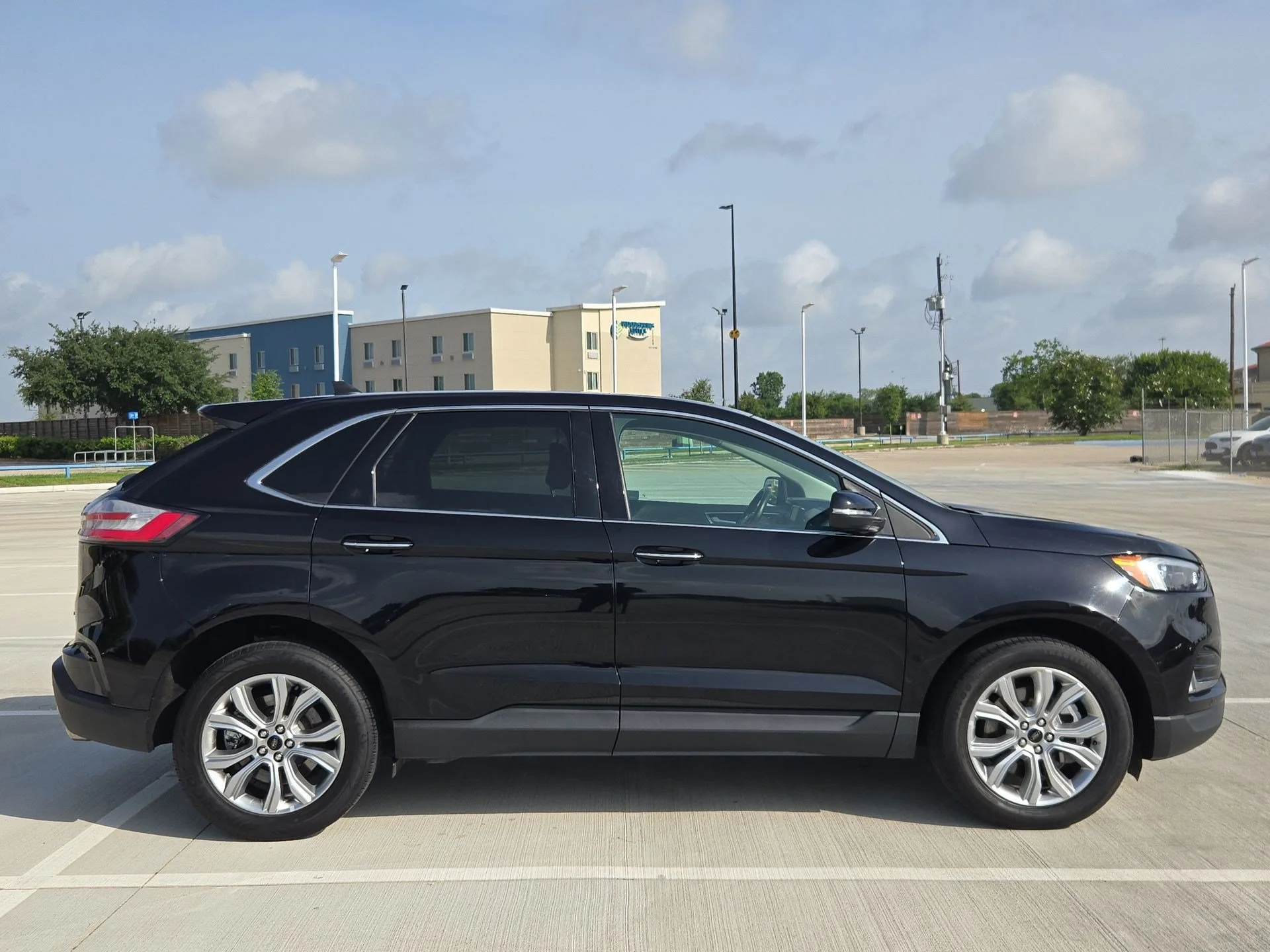 Used 2024 Black Metallic Ford Titanium image 2