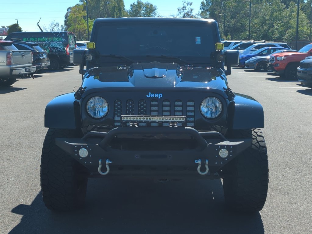 Used 2015 Black Jeep Unlimited Sahara image 10
