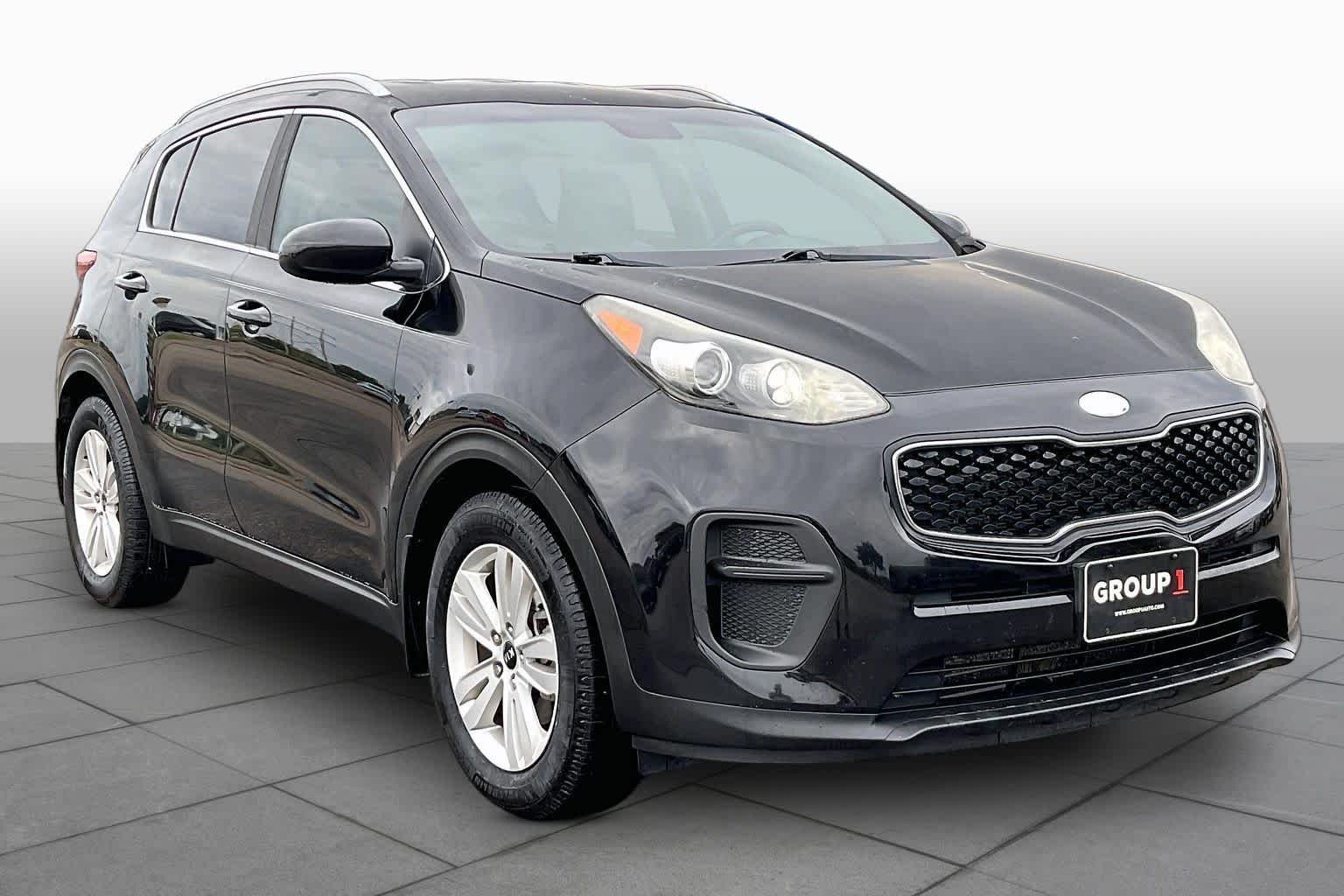 Used 2017 Black Cherry Kia LX image 2