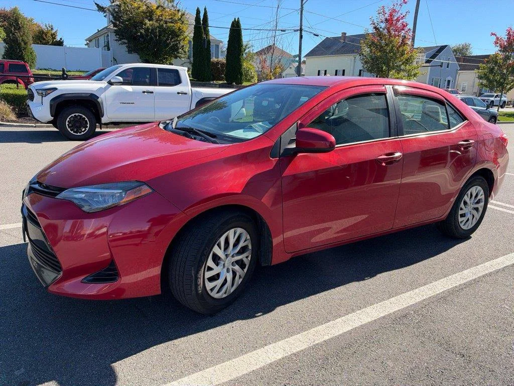 Used 2018 Barcelona Red Metallic Toyota LE image 3