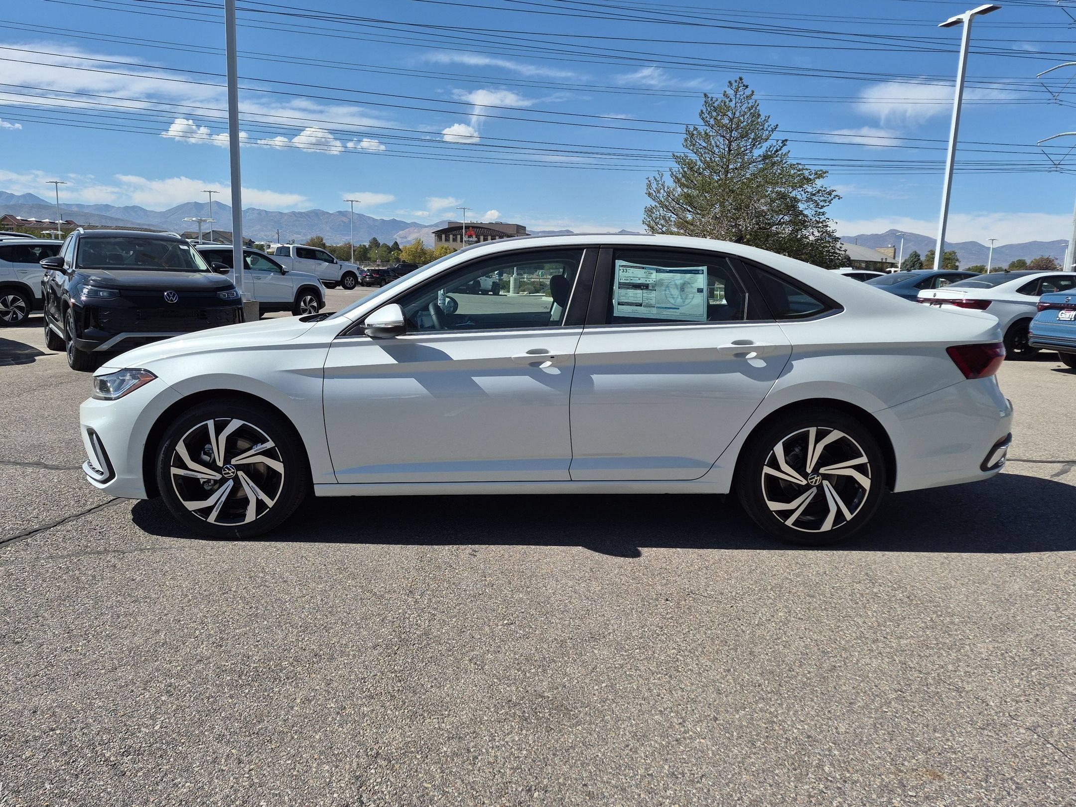 New 2027 Opal White Pearl Volkswagen SEL image 7