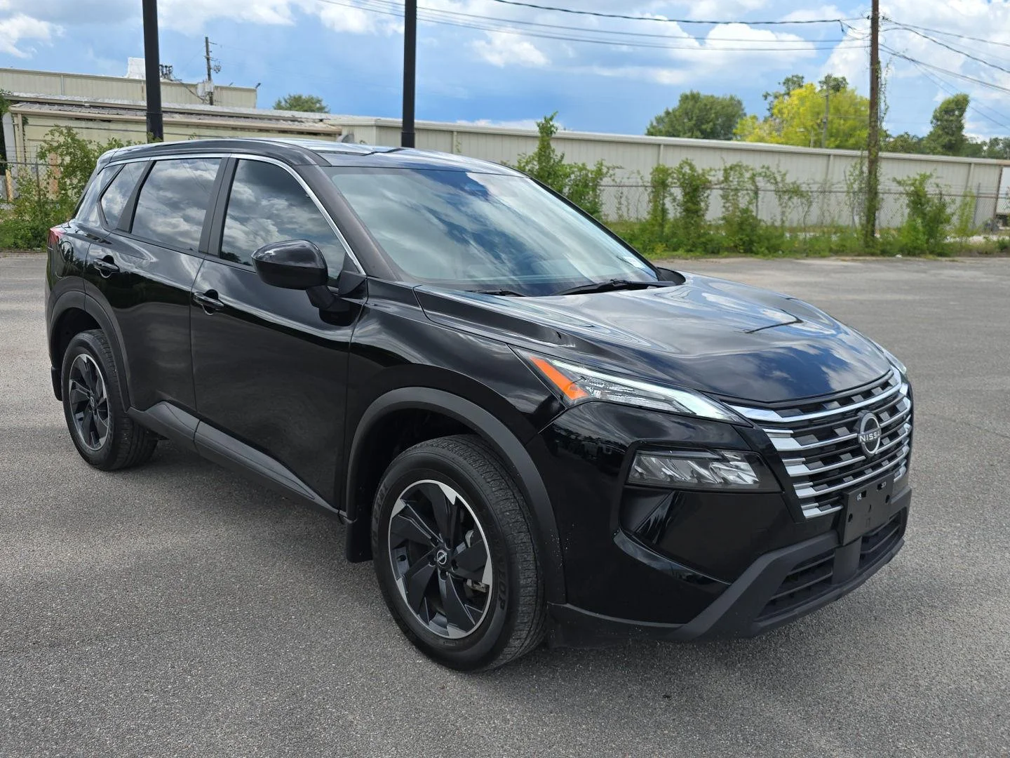 Used 2025 Super Black Nissan SV image 1