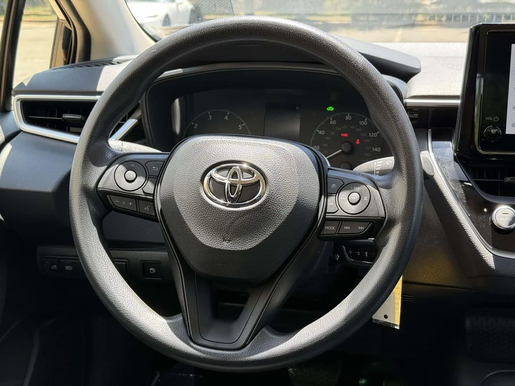 Used 2024 Black Toyota LE image 18