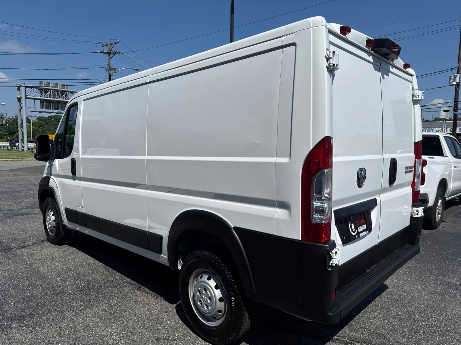 Used 2023 Bright White Clearcoat Ram Low Roof WB image 6