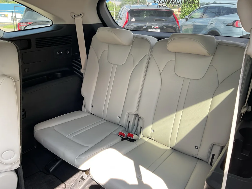 Used 2025 Mineral Blue Kia EX image 13