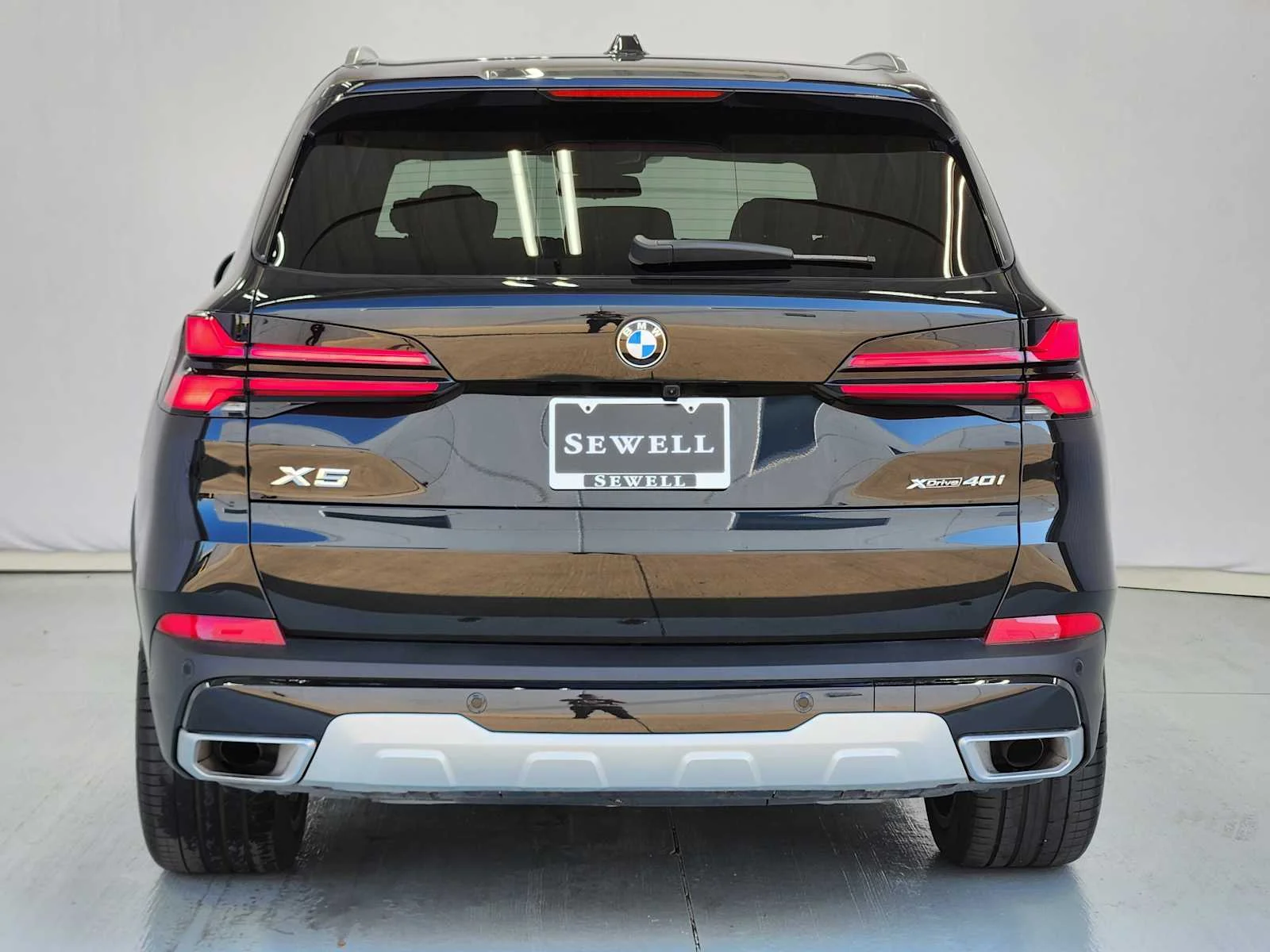 Certified Used 2025 Black Sapphire Metallic BMW xDrive40i image 7