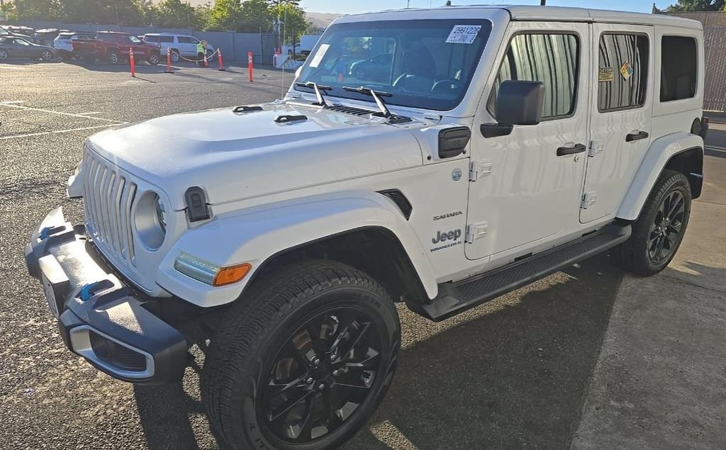 Used 2023 White Jeep Sahara 4xe image 1