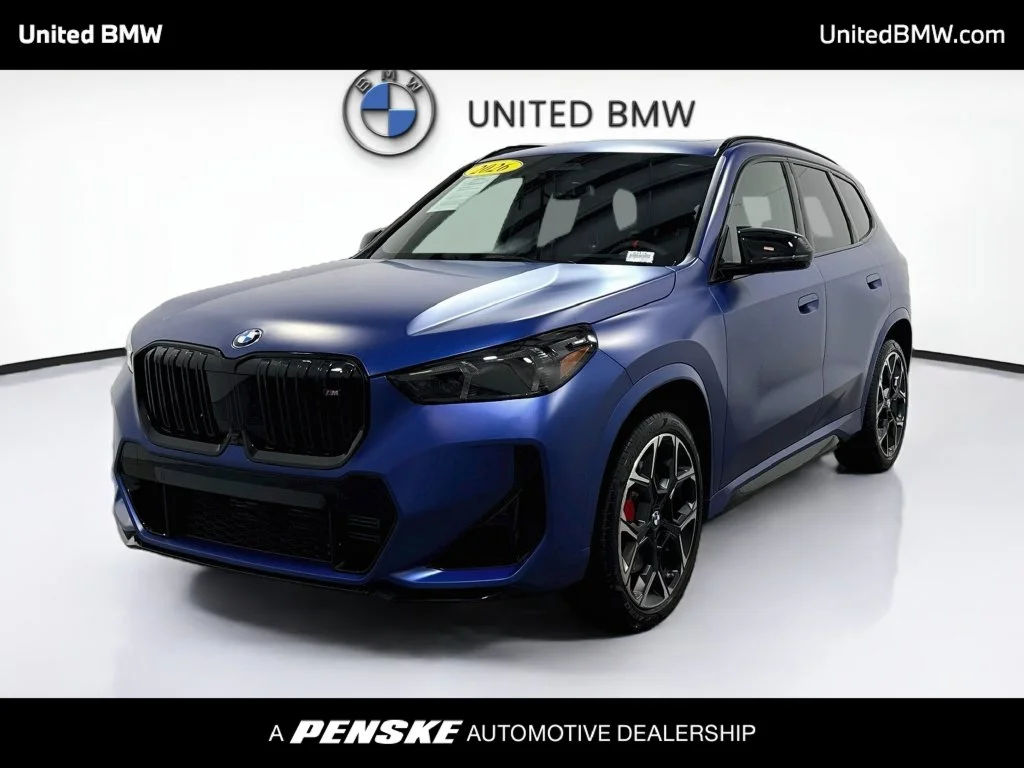 Used 2026 Frozen Portimao Blue II Metallic BMW M35i image 1