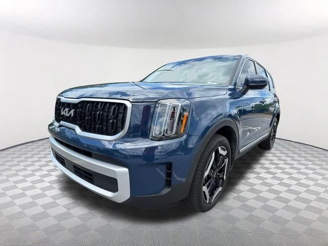 Used 2025 Blue Kia EX image 1