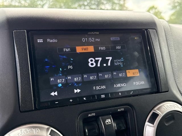 Used 2015 Orange Jeep Sahara image 3